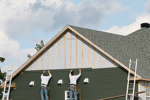 Professional Siding technician working in Dublin, VA